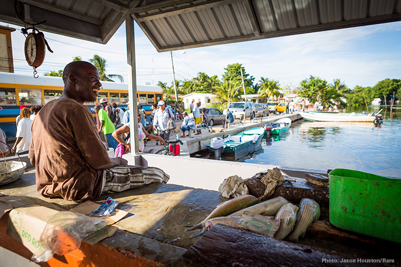 Fishermen sell their fish directly from their boats to this local market in central Belize City.