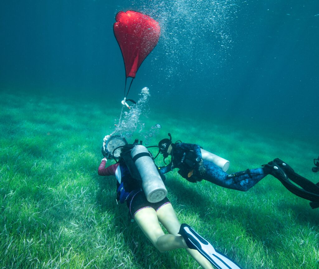 Divers training to use lift bags as part of emergency response protocols. Photo © Jennifer Adler