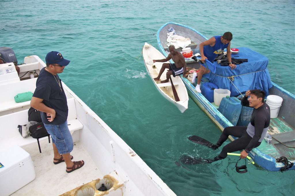 Fishermen, the government, academia, and NGOs in Belize are working together to implement a system for fishing called Managed Access, which combines territorial user-rights for fishing (TURFs) and no-take replenishment zones. Photo © Jason Houston/Rare
